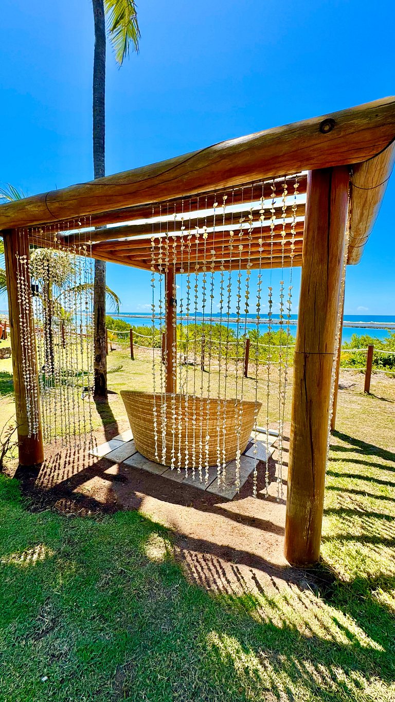 Apartamento frente mar com piscina em Resort