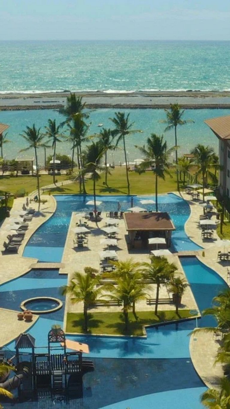 Apartamento frente mar com piscina em Resort